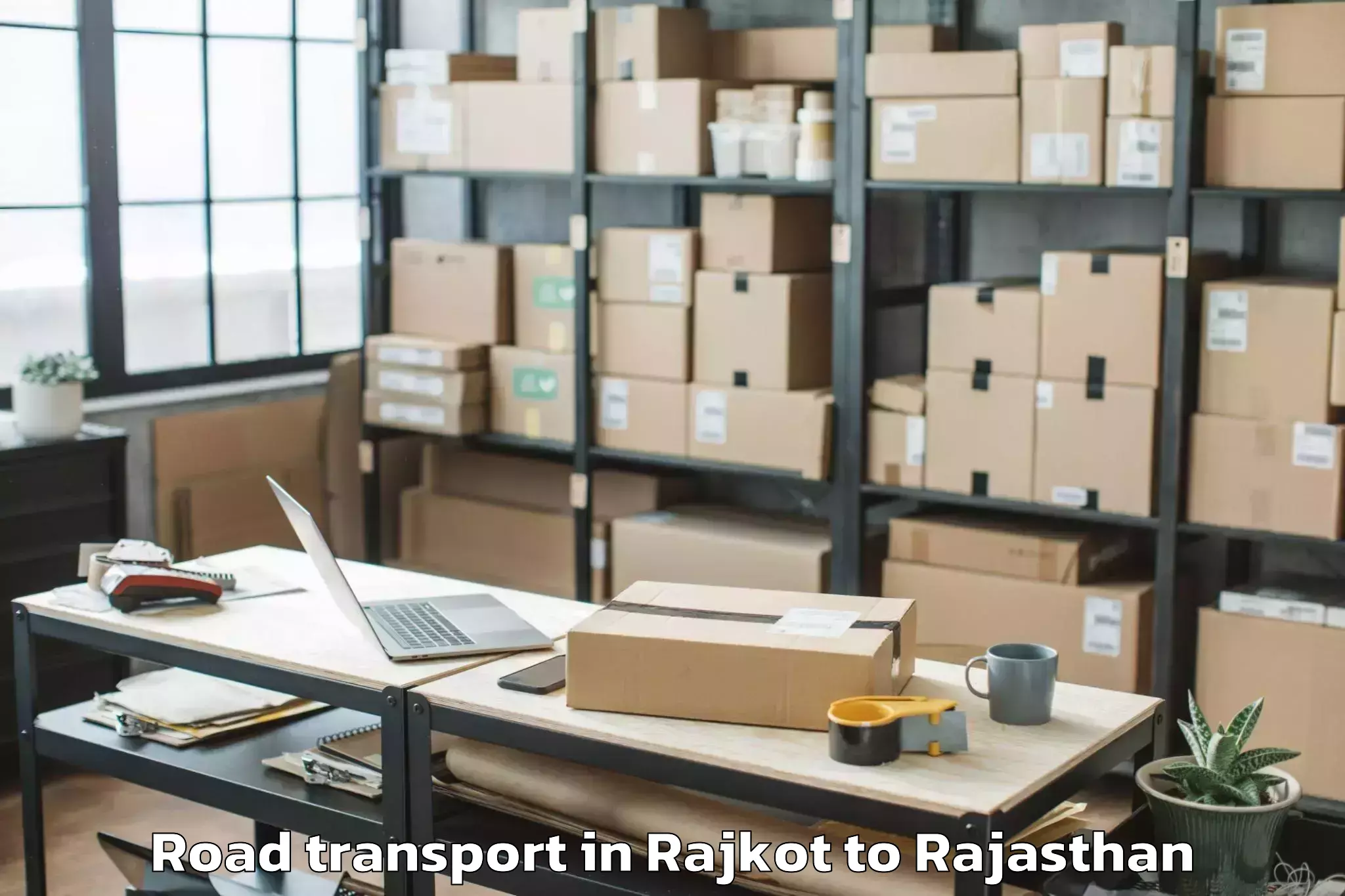 Get Rajkot to Jhadol Road Transport